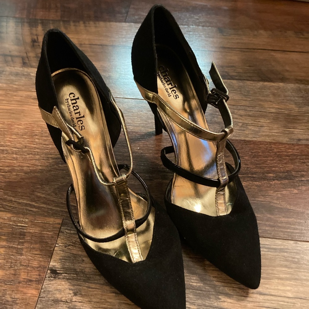 Black and gold heeled shoes worn one time